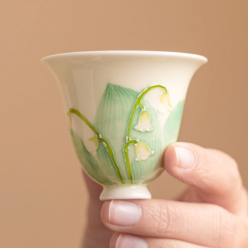 Hand drawn lily of the valley flower tea cup, ceramic host