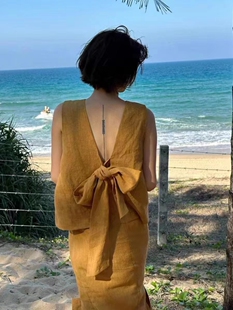 今年流行漂亮炸街减龄时尚姜黄色漏背蝴蝶结上衣两件套装裙女夏季