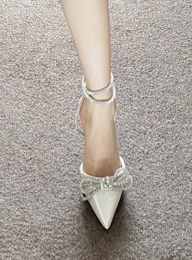 尖头高跟鞋女2025春秋款白色蝴蝶结水钻交叉扣带细跟法式包头凉鞋