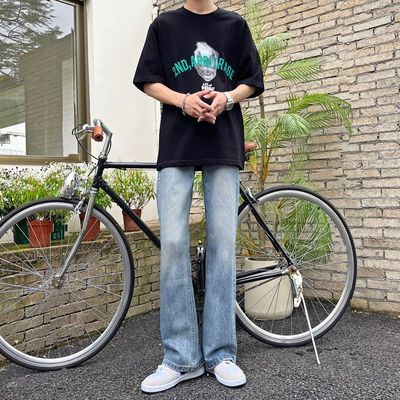 复古水洗蓝微喇叭牛仔裤