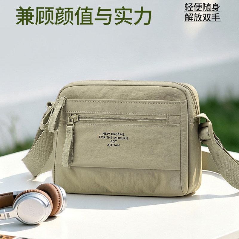 男士斜挎包轻便牛津布随身小包图片