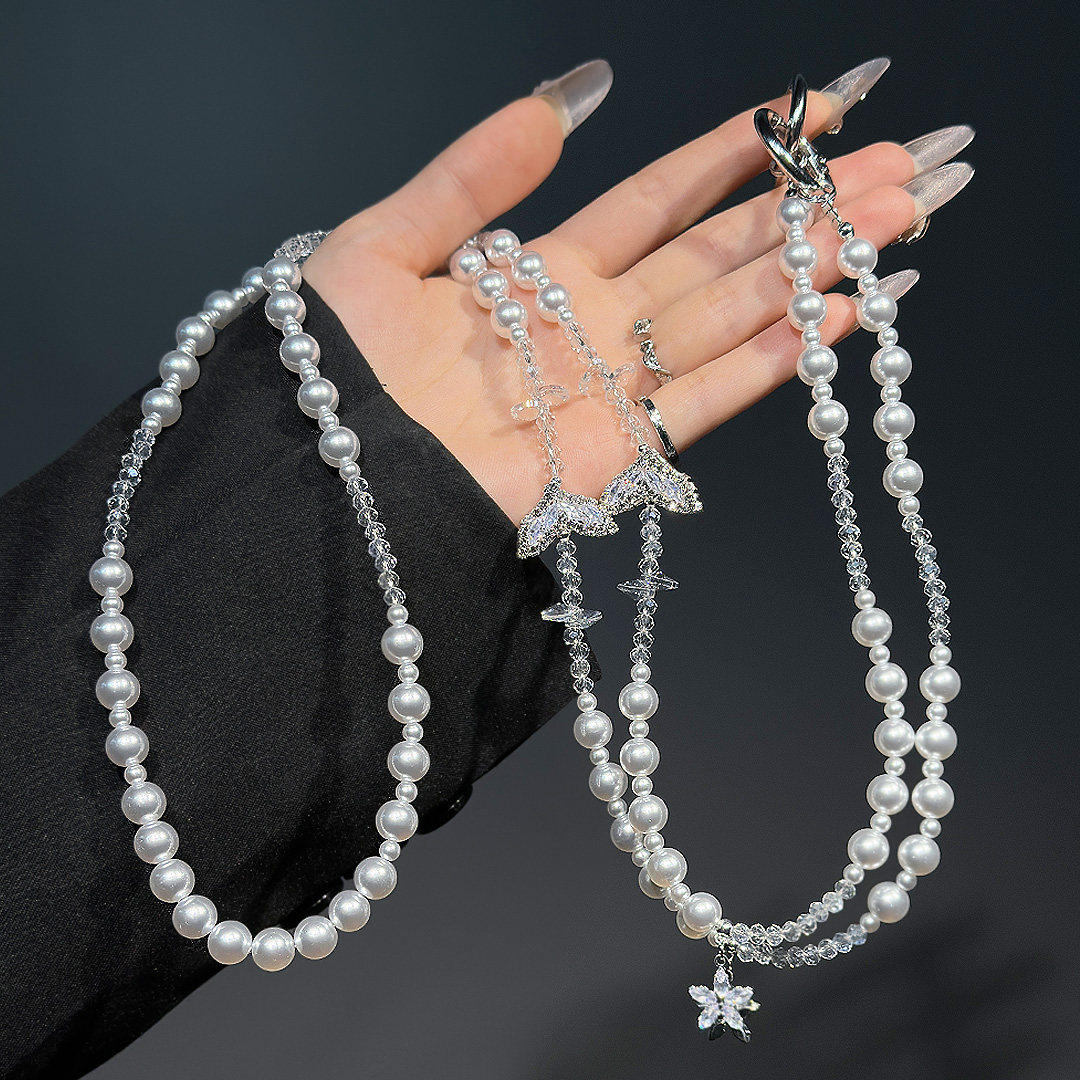 奢华高级感珍珠链新款满钻鱼尾挂绳高级轻奢水晶手机斜挎挂链长款