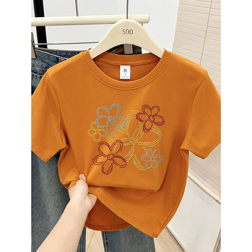 夏装2025新款线条花朵印花T恤女南瓜色圆领短袖今年流行正肩上衣
