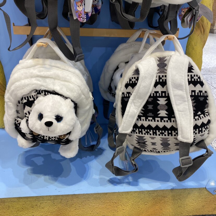 珠海长隆飞船纪念品海洋王国可爱仿真北极熊毛绒背包女孩生日礼物