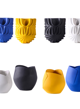 北欧风黄色陶瓷样板餐桌黑白花瓶