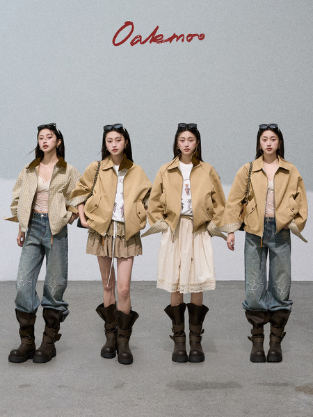 Four models wearing beige jackets styled with jeans, skirts, and black boots.