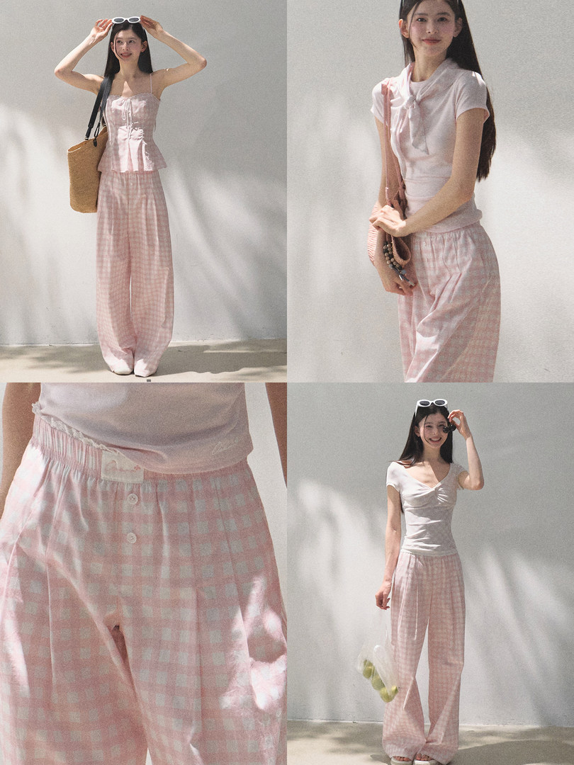 Pink gingham wide-leg pants worn with a fitted white top