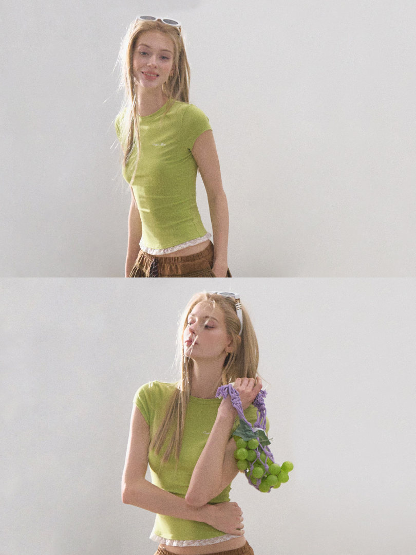 Model wearing a lime green fitted short-sleeve top