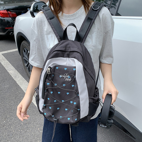 韩系高颜值爱心印花双肩包女学生通勤撞色书包大容量轻便出游背包