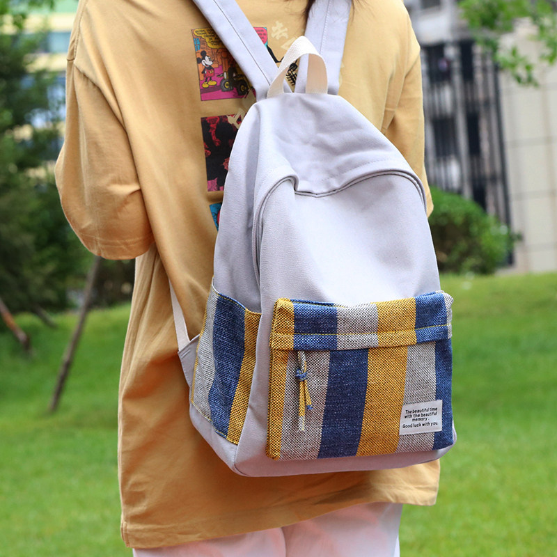 帆布撞色条纹书包女大学生初中生休闲白色双肩包女韩版背包女双肩