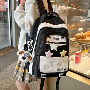 书包女生小学生三到六年级高颜值黑白大容量初中生简约防雨水双肩