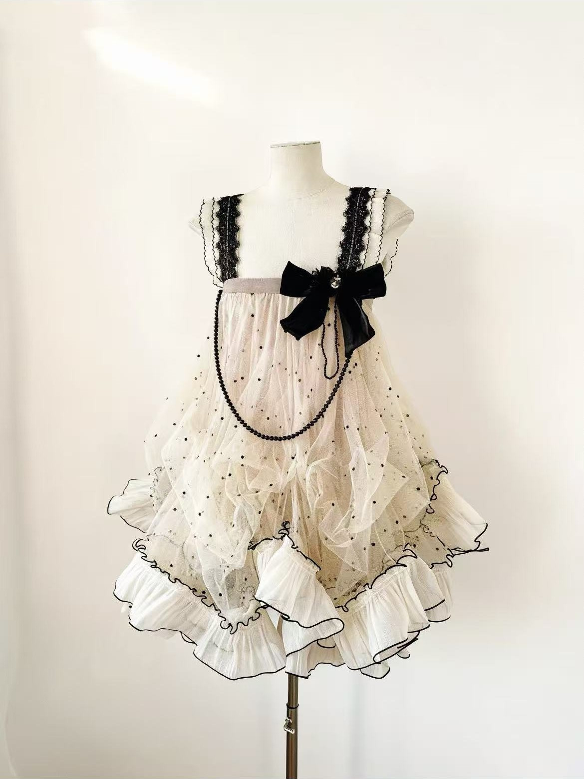 芷汀「少女乌托邦」法式浪漫蝴蝶结波点印花裙气质吊带蓬蓬裙短裙