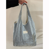 韩系蝴蝶结牛仔帆布包新款 大容量刺绣通勤学生上课单肩托特包