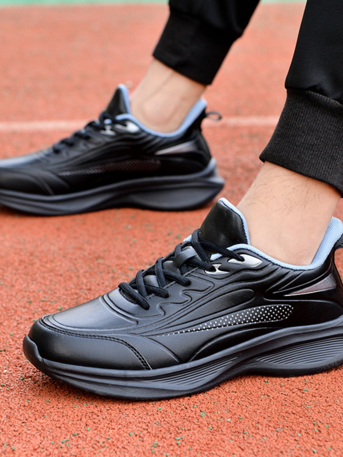 秋季特价品牌男鞋黑色运动鞋轻便软底跑步鞋皮面防水旅游鞋健步鞋