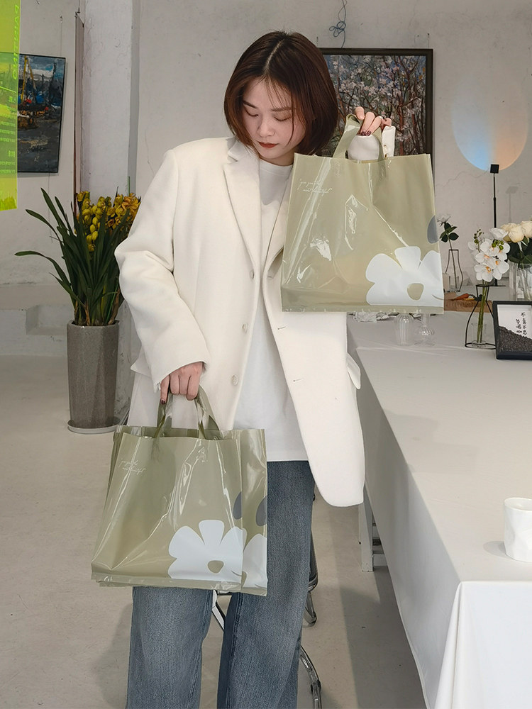 Camellia simple plastic handbag clothing store with gift bags fresh clothes bag packaging and customization