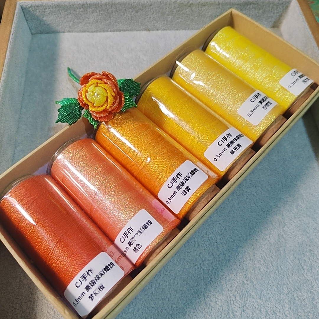 0.3炫彩蜡线纸轴一卷140米左右炫彩花花编织线手绳手牌编织线