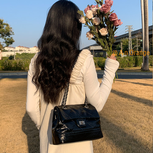 一只橙女包小香风流浪包单肩斜挎