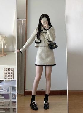 今年流行的漂亮的套装裙，对比羊毛外衣和裙子，两件套，晚冬服装