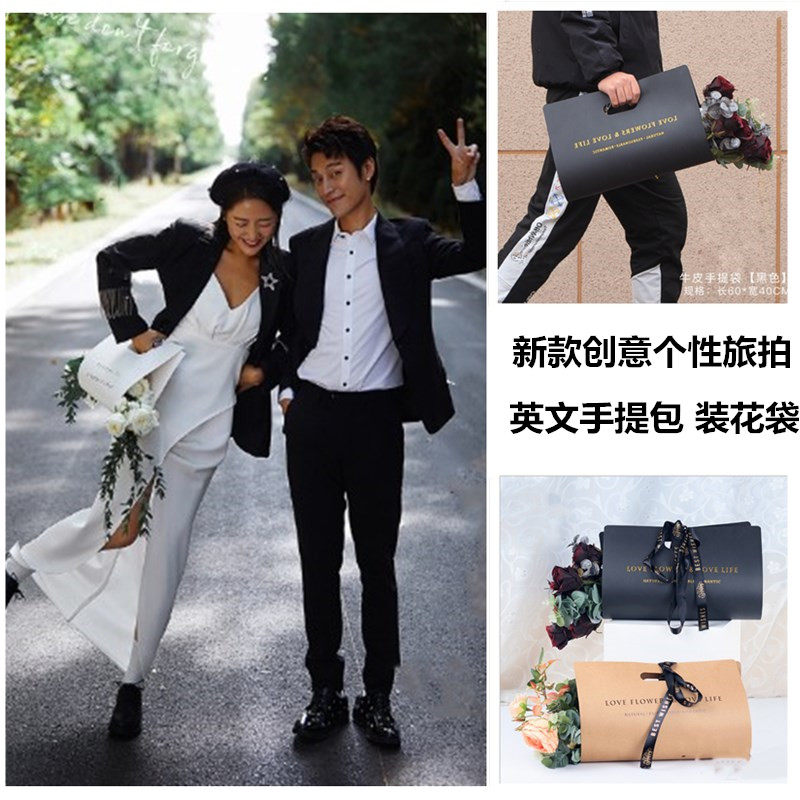 旅拍摄影道具ins风街拍英文字母手提袋影楼婚纱拍照装花牛皮纸袋