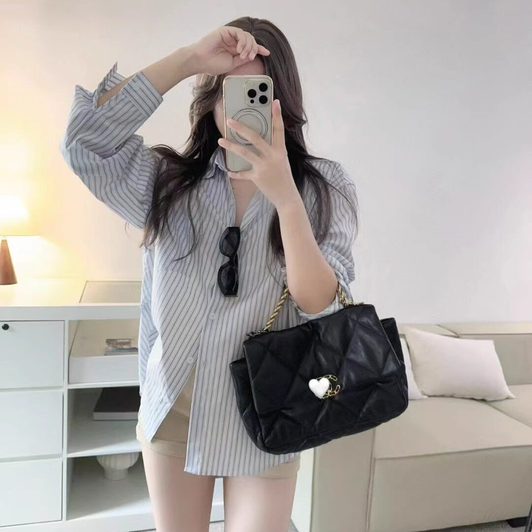 韩系chic设计感蝴蝶结露背衬衣女款2025新款纯欲风全棉宽松大衬衫