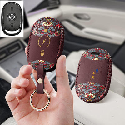 适用爱玛电动车钥匙套艾玛电瓶车露娜仰望爱琪qb33乐维爱朵扣壳套