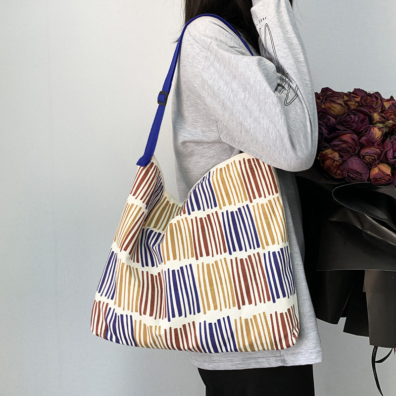 斜挎帆布包女春夏新的款大容量清新文艺手提单肩包学生书包有拉链