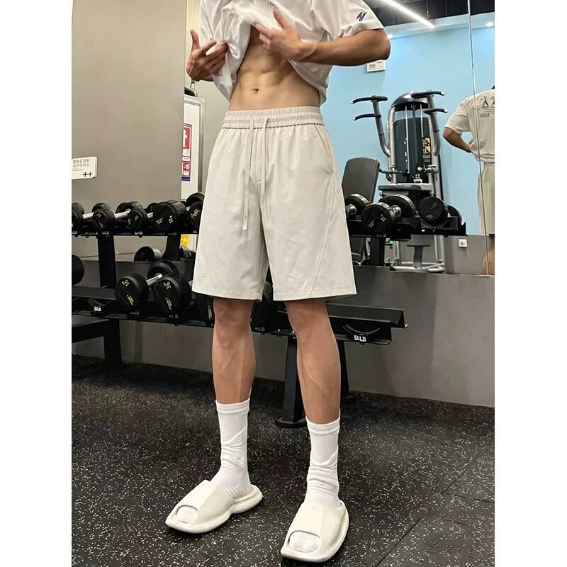美式斜切健身运动休闲短裤男夏季冰丝速干裤子慵懒风跑步四五分裤