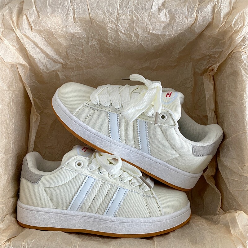 奶油色圆头滑板鞋男女布面小白鞋