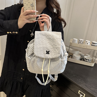 格子帆布登山包包女2025新款潮韩国学院双肩包休闲背包单肩水桶包
