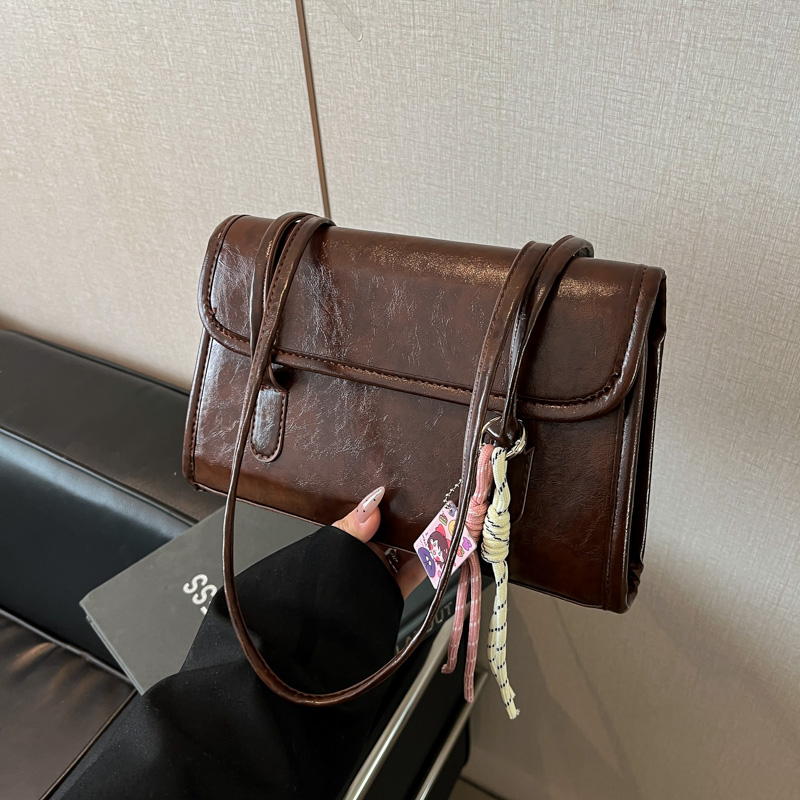 韩国小众腋下包包女士2025新款潮时尚手提通勤包百搭大容量单肩包