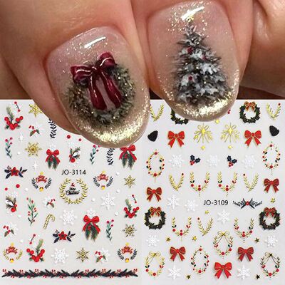 Christmas nail art stickers featuring shiny gold and silver