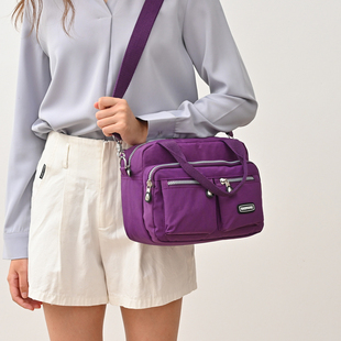 紫色多口袋邮差包女斜挎包单肩包休闲百搭轻便尼龙包适合出行旅游