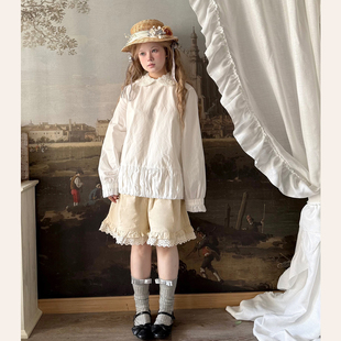 可爱肌理褶皱娃娃领白色衬衫 女秋宽松拼接泡泡下摆衬衣 岛 Labeau