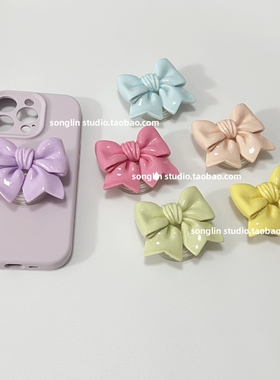 创意立体蝴蝶结多巴胺纯色简约手机壳支撑背贴便携可伸缩气囊支架