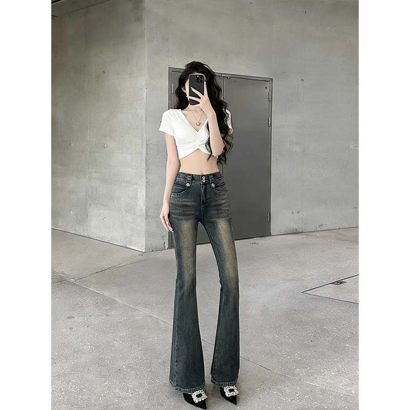 复古拼接设计紧身微喇牛仔裤女2026春季新款辣妹修身提臀喇叭裤子