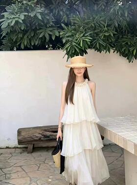 2026夏超仙度假风挂脖女生连衣裙巨好看小清新无袖设计感蛋糕长裙