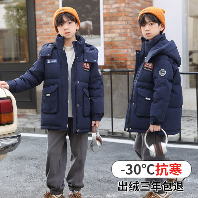 东北哈尔滨旅游儿童羽绒服男童