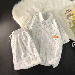 夏男女1404-1-dk06-C32-p75宽松阔裤薄款短裤中裤休闲套装图片