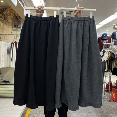 韩系简约下摆木耳边花苞半身裙