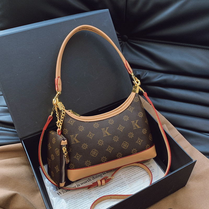 小众质感手提月牙包包女式2025新款轻奢高级感单肩斜挎老花腋下包