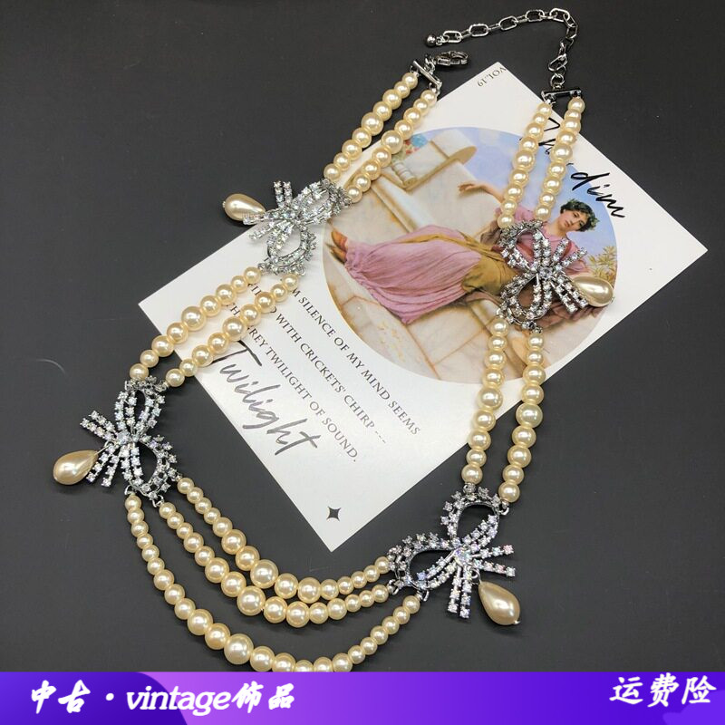 法式精致爪镶锆石蝴蝶结香槟色珍