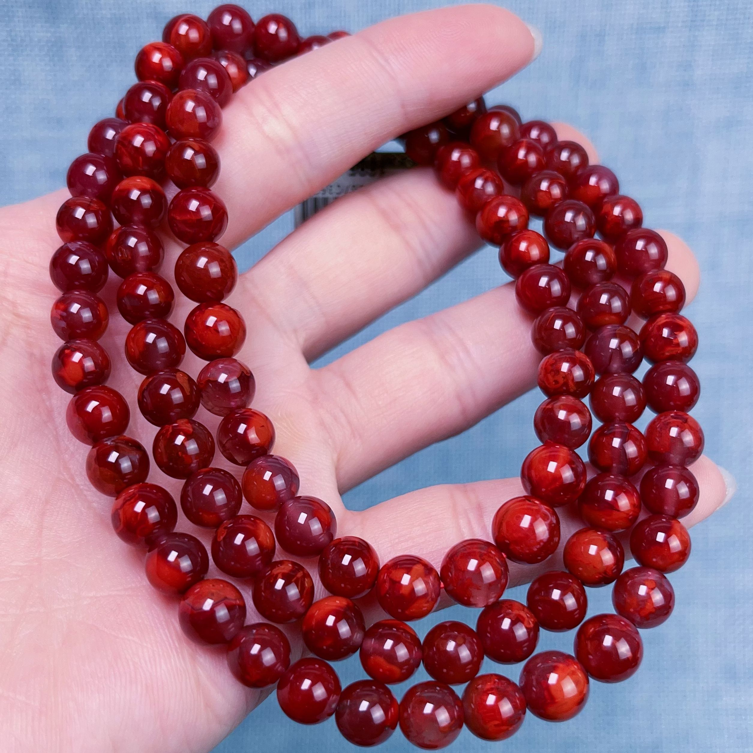 759A54凉山瓦西料南红妖牛血多圈手串