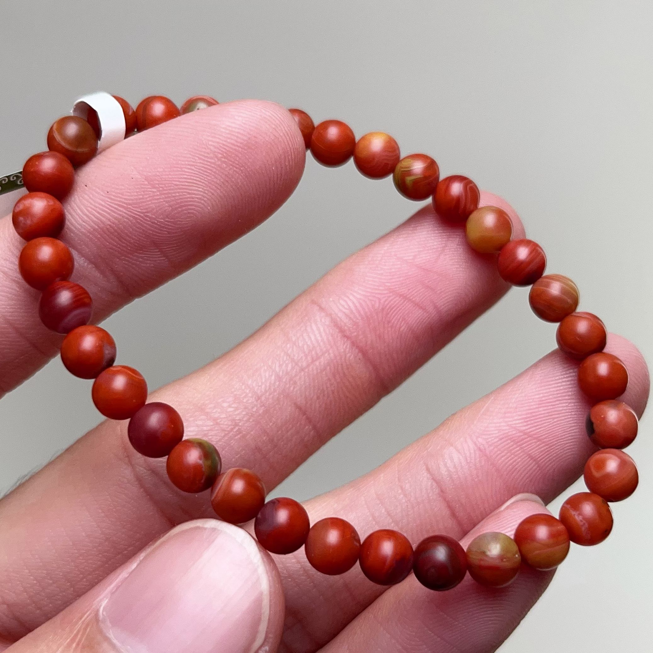 071C19凉山九口料南红鸡血包浆单圈手串