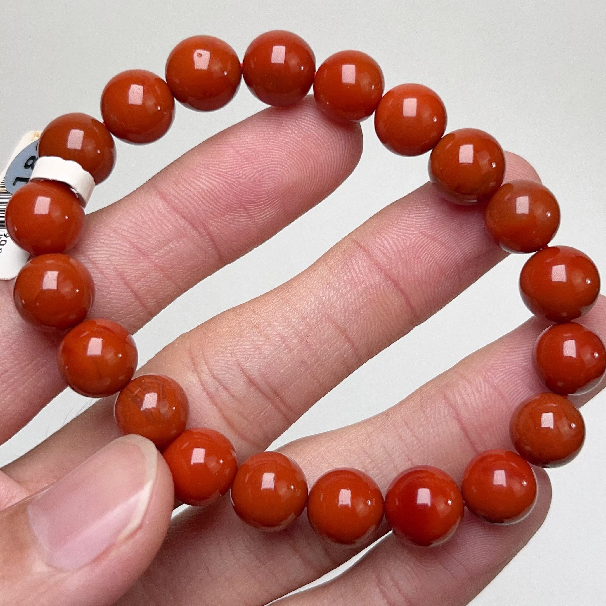 959D05凉山瓦西料南红柿子锦单圈手串