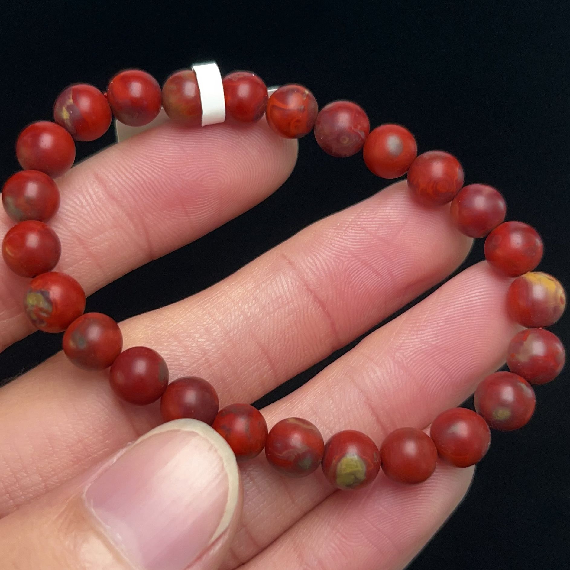 4909A01凉山九口料南红九口鸡血包浆哑光单圈手串