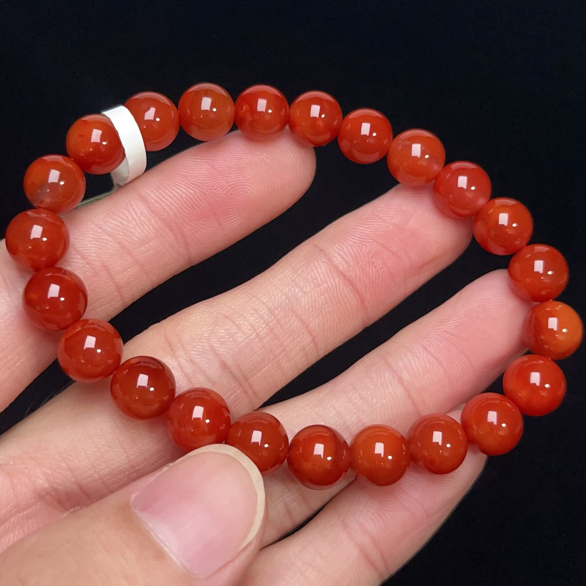 1005C48凉山瓦西料南红锦红单圈手串