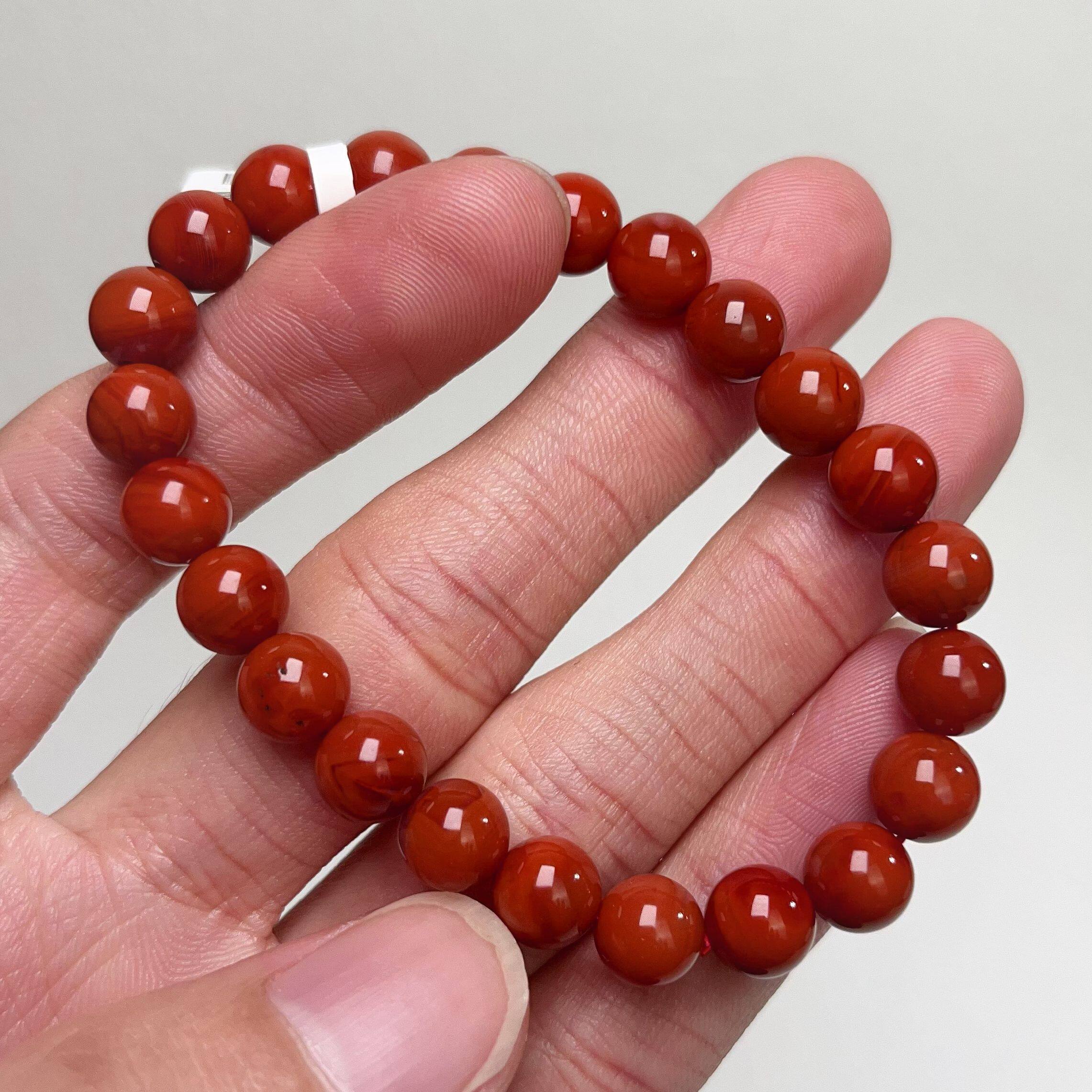 257F89凉山瓦西料南红满色肉柿子锦红单圈手串