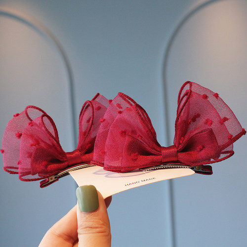 洋气波点纱立体蝴蝶结发夹