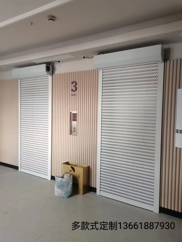 实体工厂定制入户电梯铝合金电动卷帘门防盗镂空电梯专用卷帘门。