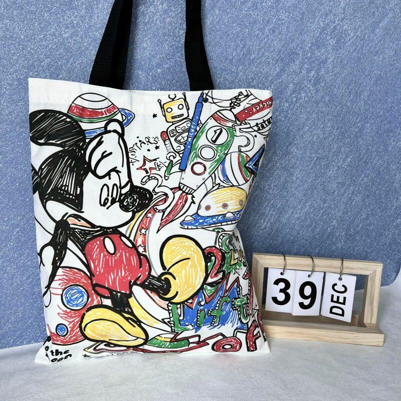 唐老鸭米奇单肩帆布包女INS欧美卡通学生作业书包百搭卡通帆布袋